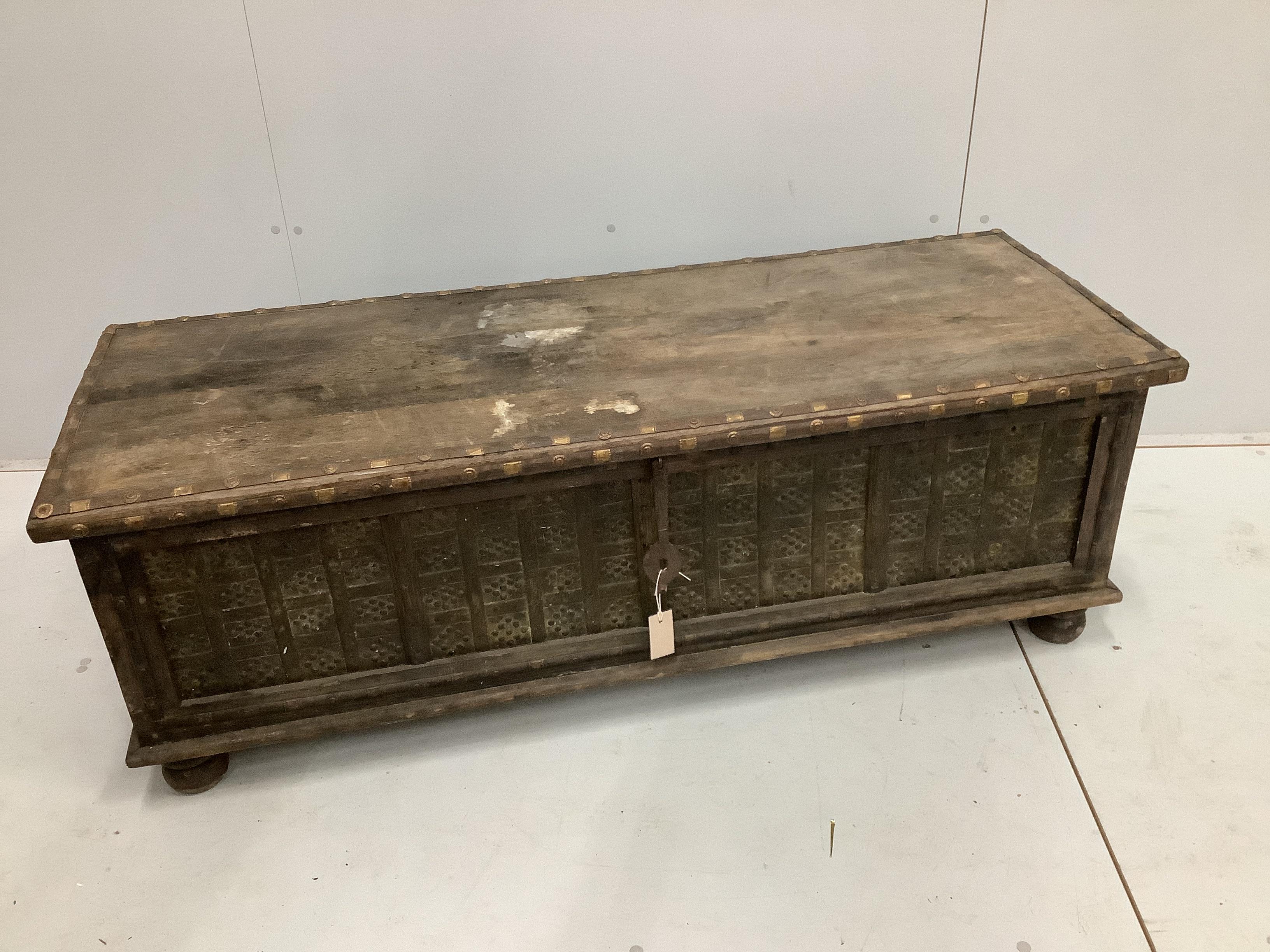 A Zanzibar style brass mounted hardwood coffer, width 142cm, depth 51cm, height 49cm